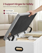 Hand lifting the bench lid, held steady by 2 safety hinges