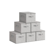 Set of 6 dove grey fabric storage boxes stacked in a pyramid arrangement showing zipped lids and side handles