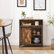 Rustic brown cabinet in a dining room holding crockery and storage boxes