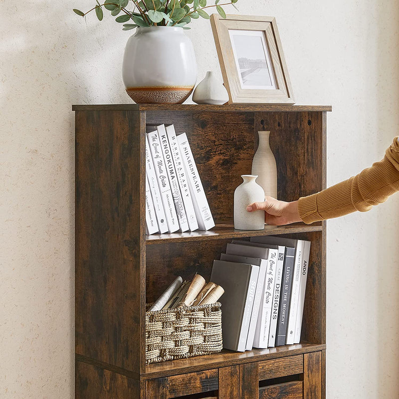 Top surface of the rustic brown cabinet styled with a plant pot and a framed picture