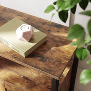 Close-up of the wood-effect tabletop with a small gift box resting on it