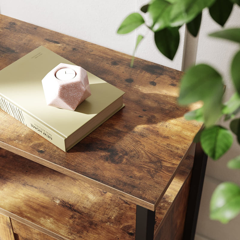Close-up of the wood-effect tabletop with a small gift box resting on it