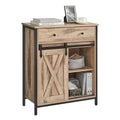 Toasted oak and black Vasagle storage cabinet with sliding barn door and drawer, front view