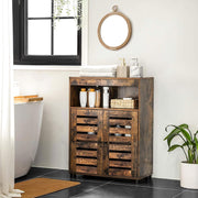 Cupboard in a bathroom beside a bath, holding towels and toiletries