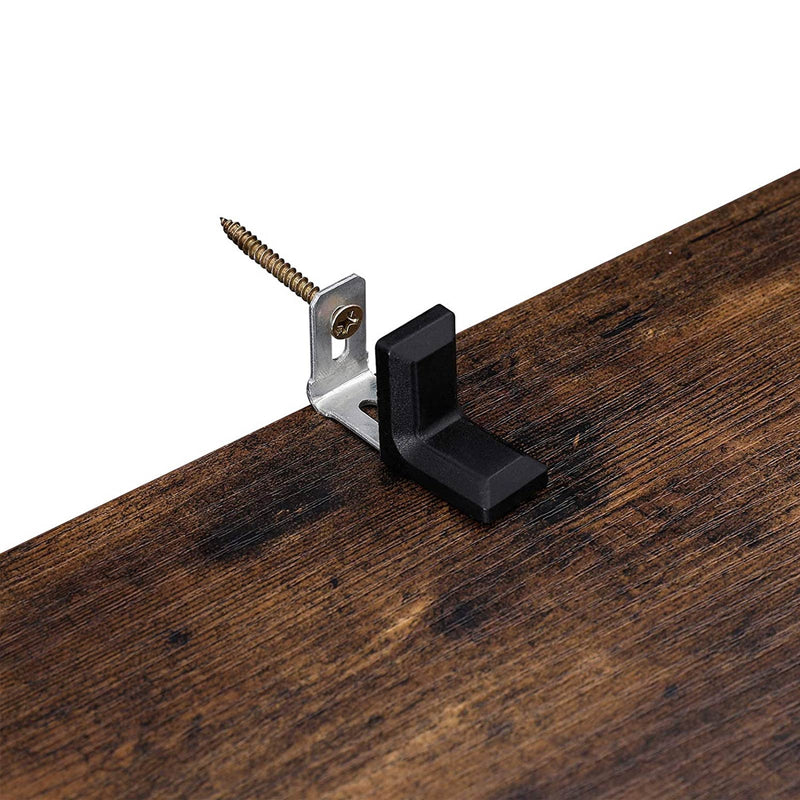 Anti-tip wall bracket and fixing screw shown on the cupboard panel