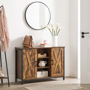 Rustic brown sideboard in a hallway below a round mirror with a vase and cups on top