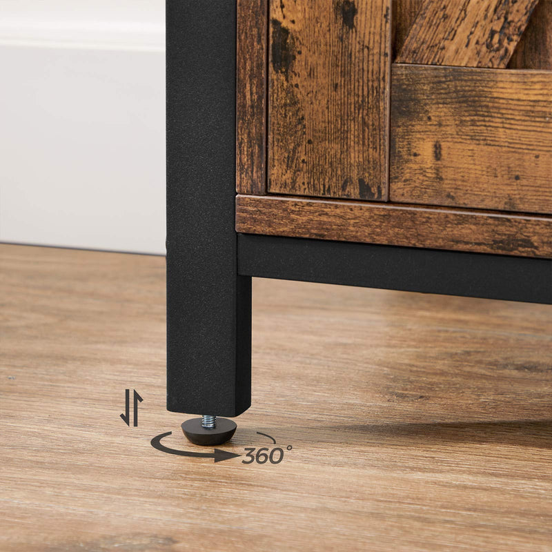 Close-up of a black steel leg with an adjustable foot on a wooden floor