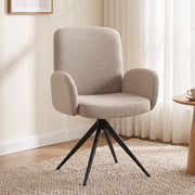 Light brown swivel accent chair in a bright living room beside a wooden side table