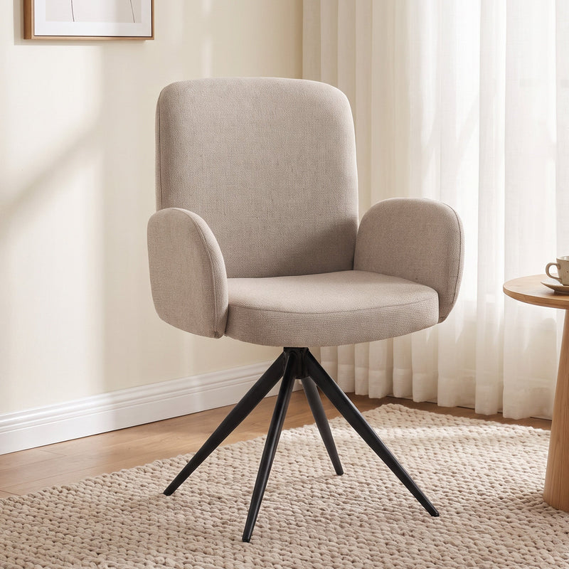 Light brown swivel accent chair in a bright living room beside a wooden side table