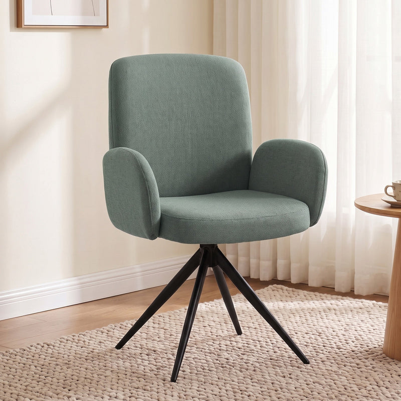 Light green swivel accent chair in a bright living room beside a wooden side table