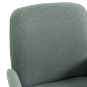 Close-up of the rounded light green padded chair back and arm