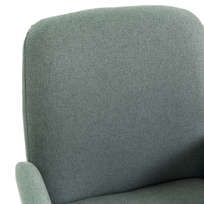 Close-up of the rounded light green padded chair back and arm