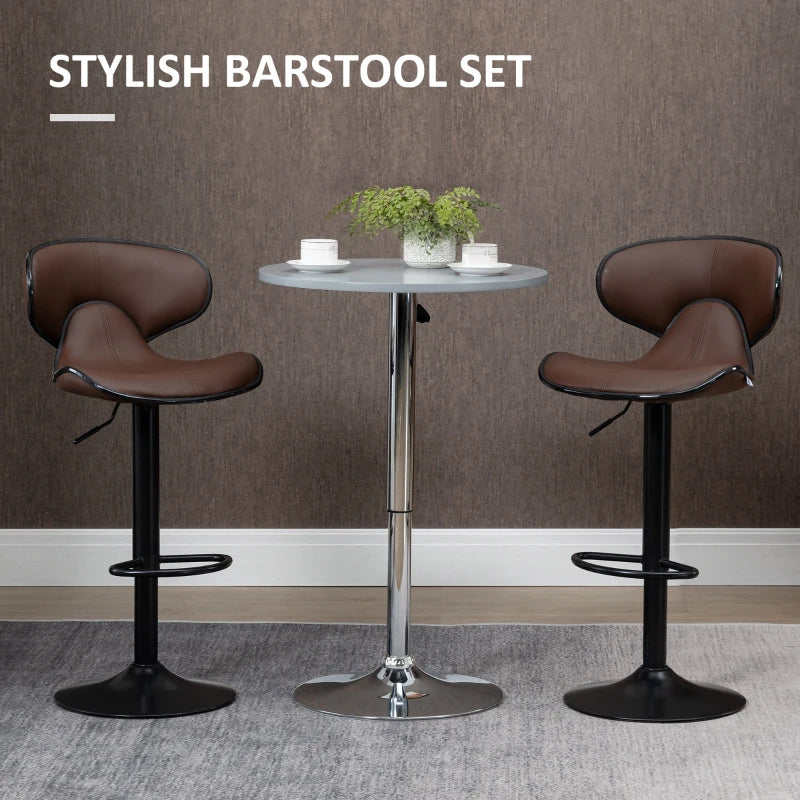 Brown curved-back bar stools either side of a small round bistro table
