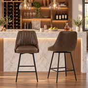 Two dark brown bar stools at a marble breakfast bar with a wine rack behind