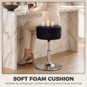 Person seated on the black stool showing the soft foam cushion compressing under them