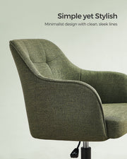 Close-up of the curved green cotton-linen fabric shell and stitched armrest