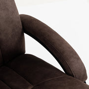 Close-up of the padded C-shaped armrest and seat cushion edge