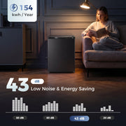 Low noise and energy use graphic with the freezer next to a reading chair at night