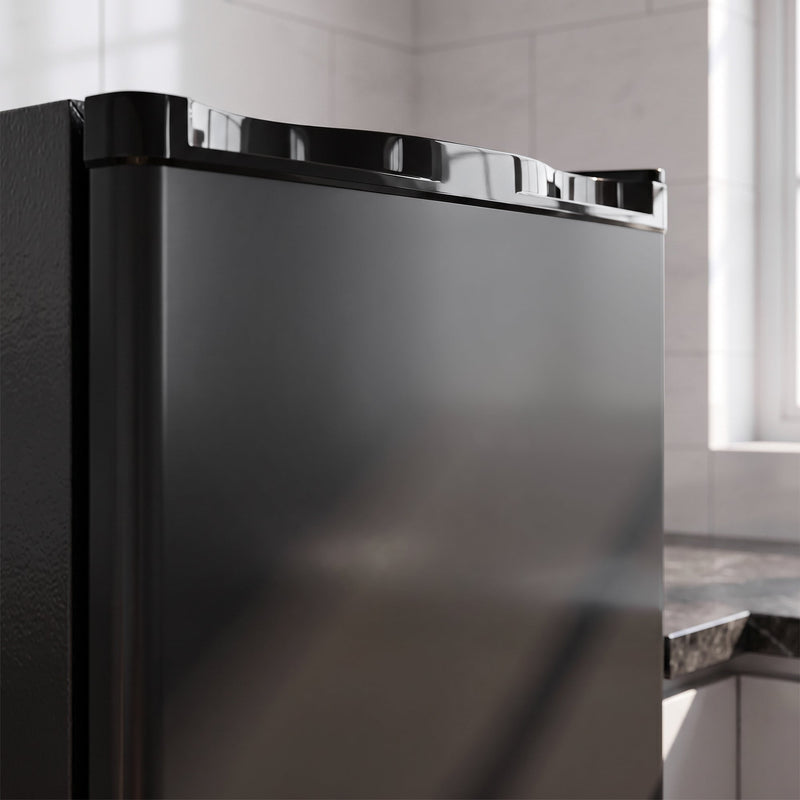 Detail of the freezer top edge and recessed door grip