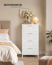 Songmics by Songmics Home branded lifestyle shot of the white corduroy chest with fresh flowers and a round mirror