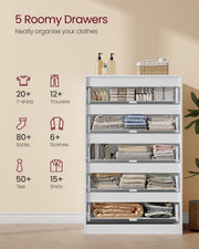 White chest with 5 drawers of folded clothes and storage counts for T-shirts and trousers