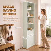 Light green bookcase fitted into a narrow hallway, shown beside a person for scale