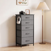 Chest of drawers beside a floor lamp with headphones on the side hook, shown in grey