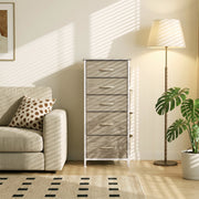 Chest of drawers next to an armchair with a lamp and plant in a living room, shown in oak