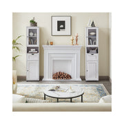 Pair of Vasagle tall bathroom cabinets used as display storage either side of a living room fireplace