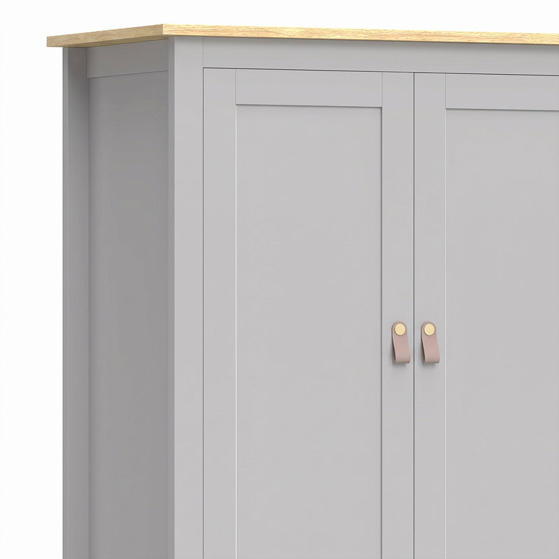 Close-up of the grey cupboard doors with tan pulls and wood-effect top
