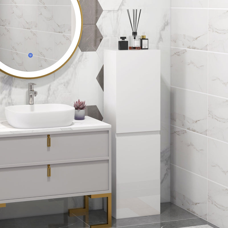 Tall white bathroom cabinet beside a vanity with a round mirror and a basin