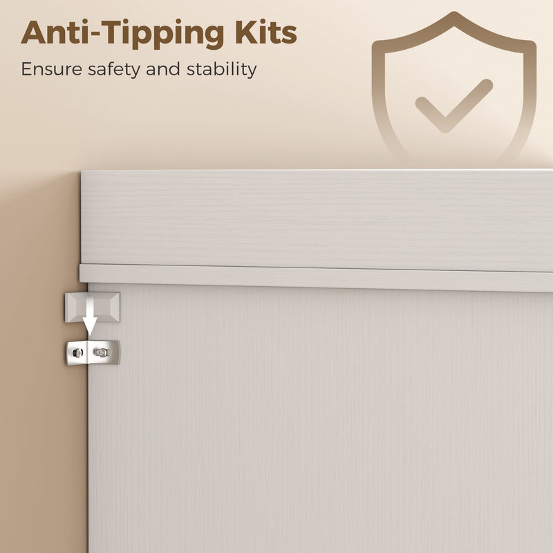 Close-up of the anti-tip wall anchor fitted to the top of the white kitchen cupboard