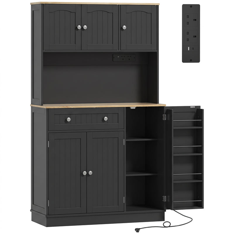 Front view of the tall black oak kitchen pantry cupboard