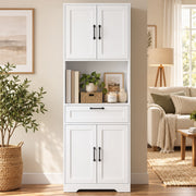 White pantry in a living space beside plants and a floor lamp