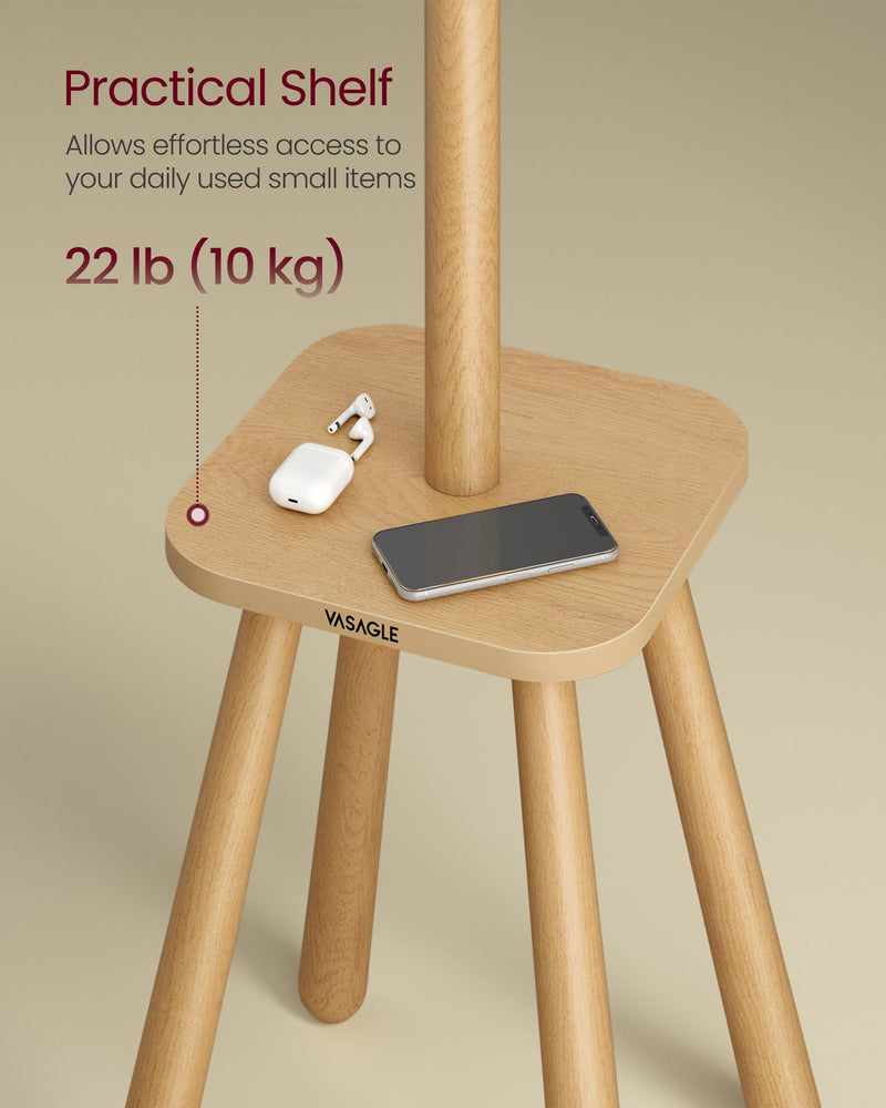 Close-up of the coat rack shelf holding a phone and earbuds, showing 10 kg shelf capacity