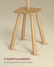 Close-up of the coat rack four-legged base with Vasagle logo, showing a stable footprint
