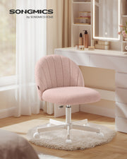 Teddy fleece swivel office chair in Jelly Pink styled at a bedroom dressing table