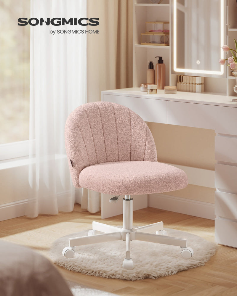 Teddy fleece swivel office chair in Jelly Pink styled at a bedroom dressing table