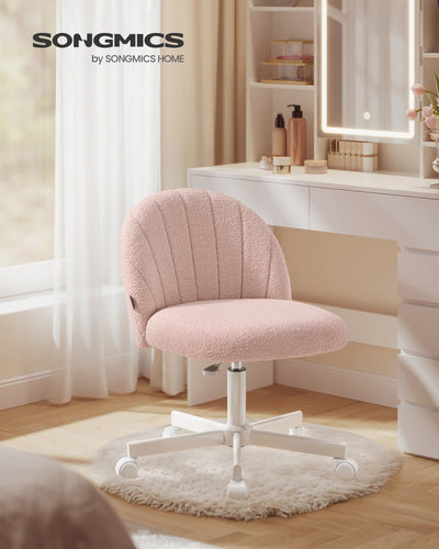 Teddy fleece swivel office chair in Jelly Pink styled at a bedroom dressing table