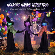 Holding Hands Witch Trio title card shown at a decorated Halloween party