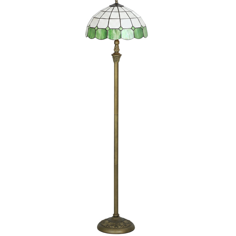 Full-length studio view of the floor lamp with the stained glass shade unlit