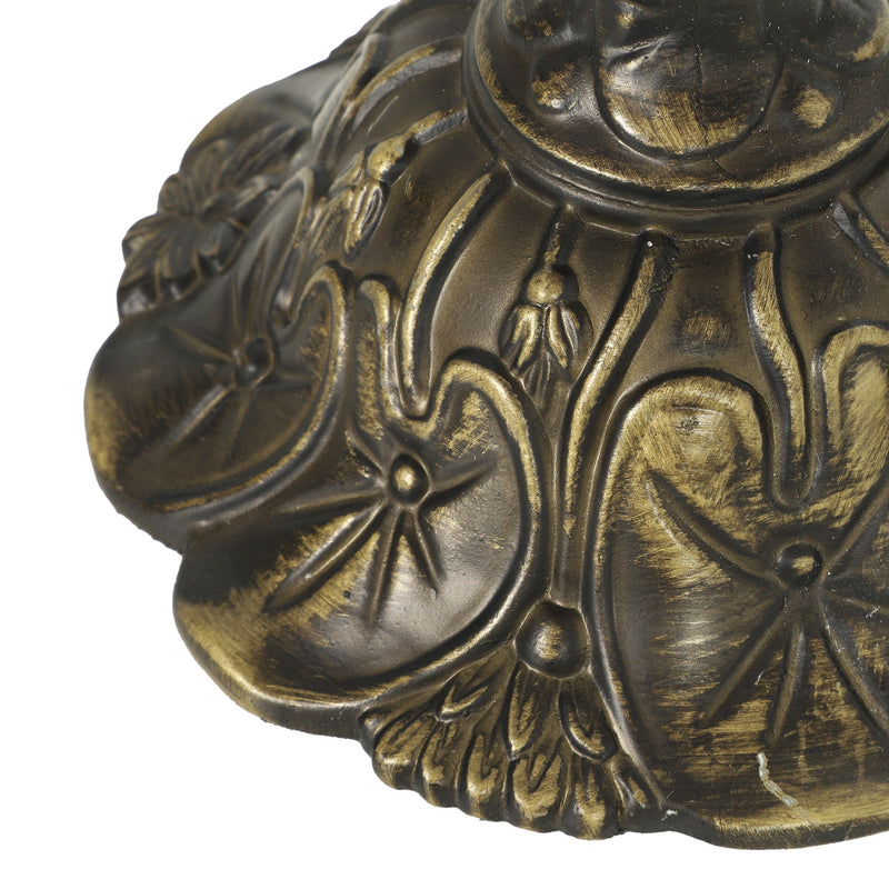 Close-up of the ornate bronze-tone lamp base