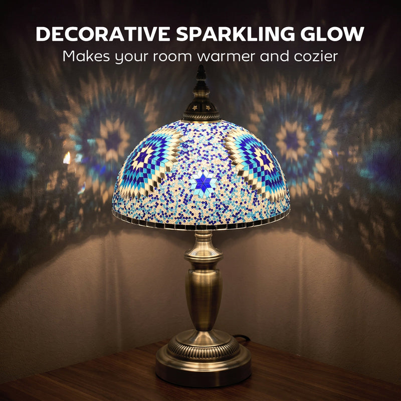 Table lamp glowing warmly in a dark room with light patterns on the wall either side