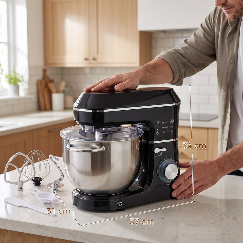 Stand mixer on a worktop with 37 cm, 31 cm and 34 cm dimensions marked and attachments laid out