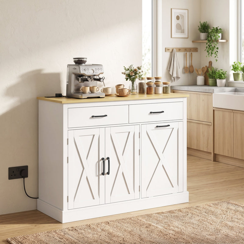 White tilt out trash cabinet styled as a kitchen island with a coffee maker and crockery on the worktop