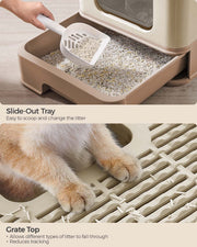 Cat litter box styled in a home setting with the included scoop