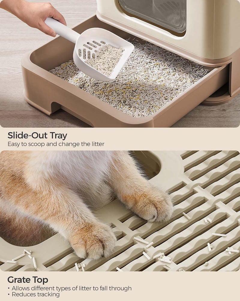 Cat litter box styled in a home setting with the included scoop