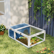 Tortoise house shown with a tortoise inside the run