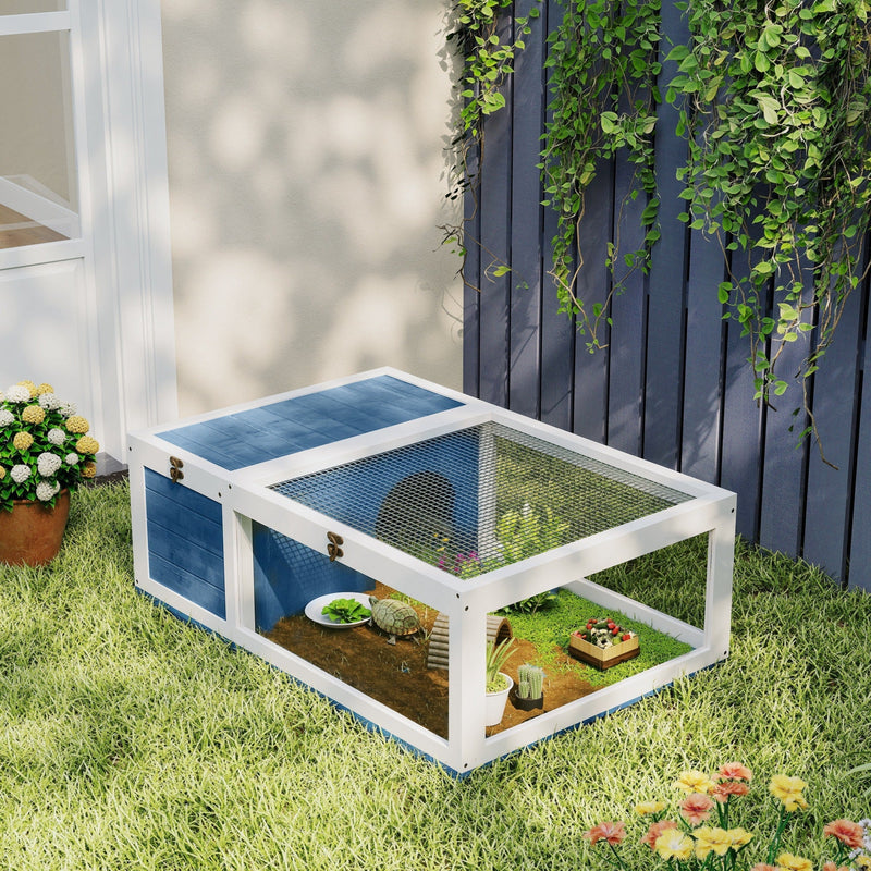 Tortoise house shown with a tortoise inside the run