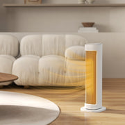 White tower heater warming a living room beside a cream sofa